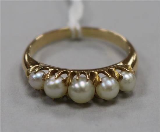 A gold and cultured pearl half hoop ring, size N.